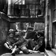 Children sleeping in Mulberry Street, 1890.